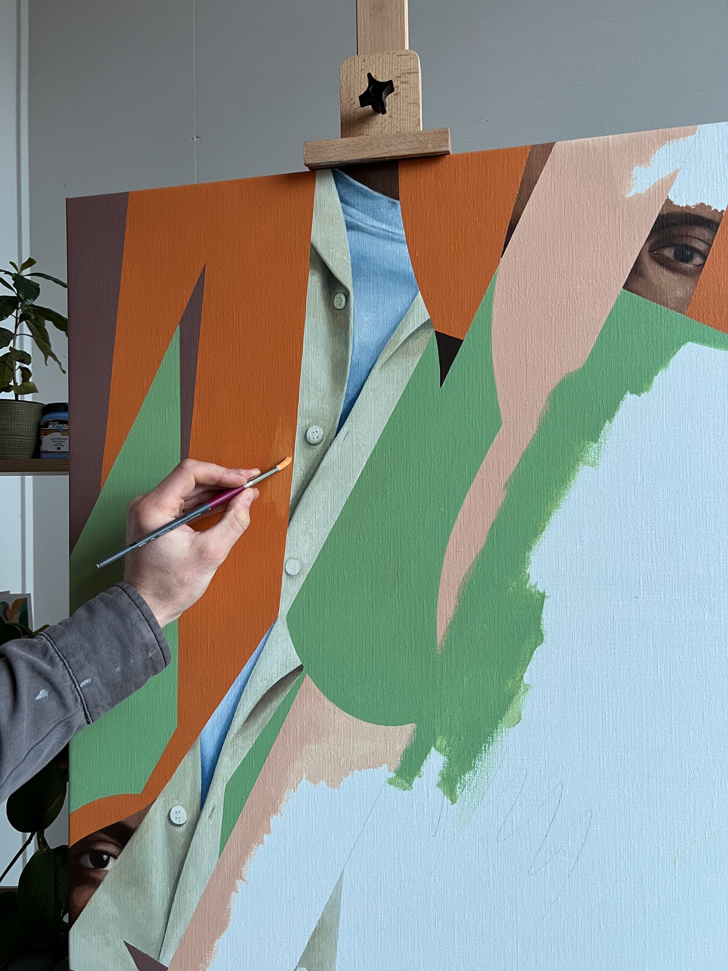 abstract portrait painting in progress green and orange