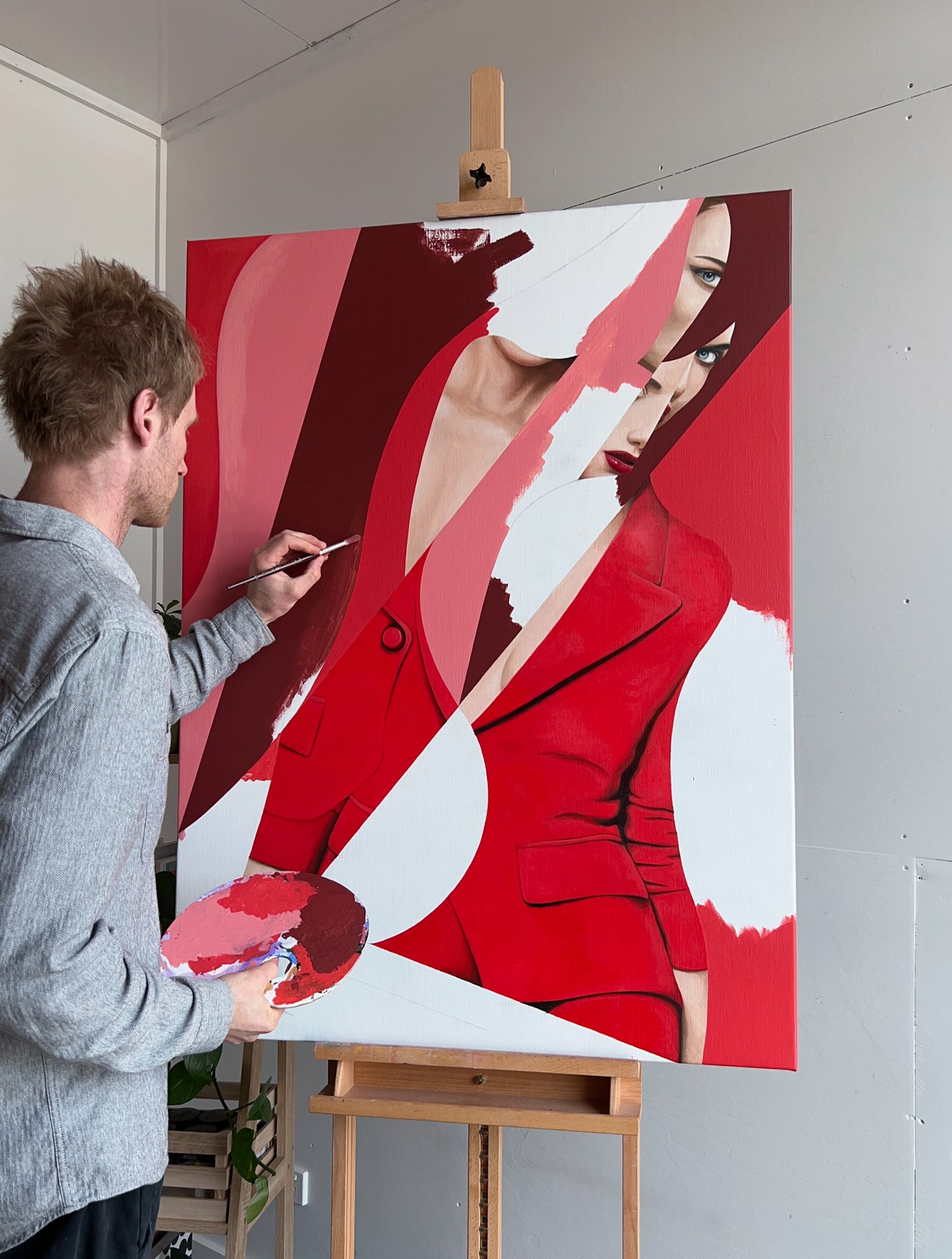 melbourne artist hilton owen painting in his art studio